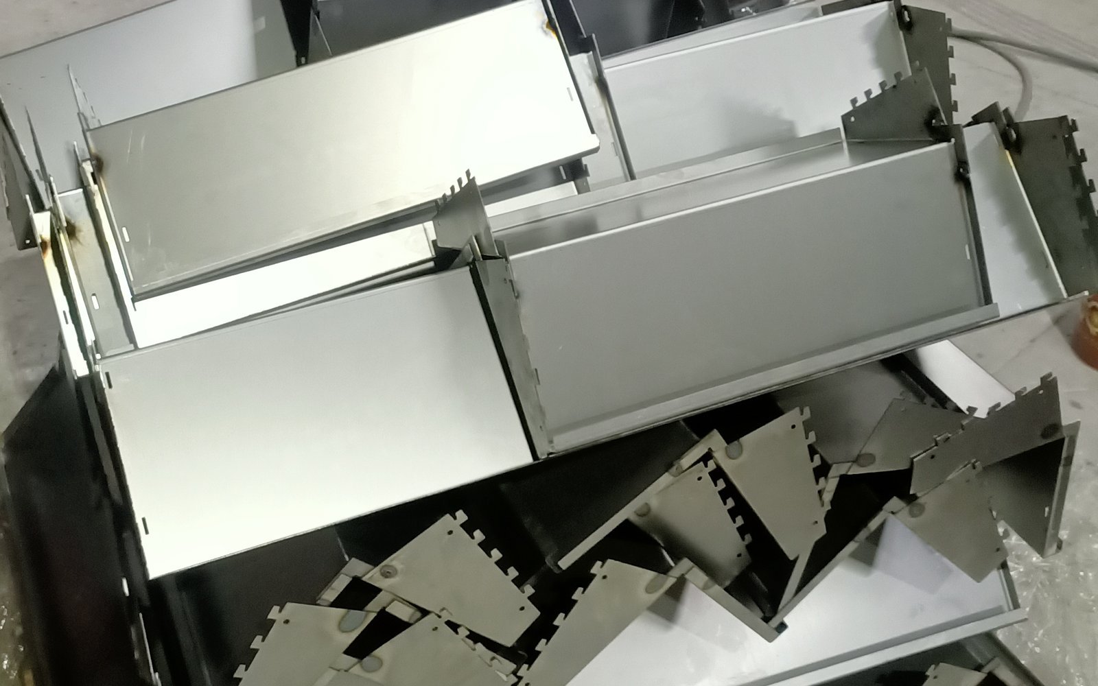 Precision folded sheet-metal components